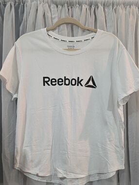 #212 Womens Reebok White Short Sleeve Logo Tee with Black Chest Marking